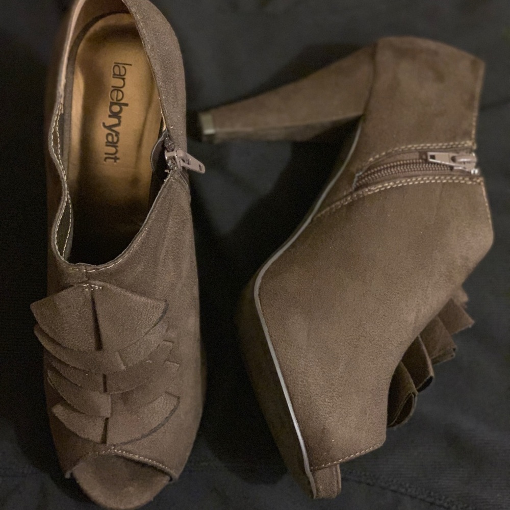 Brown suede heeled booty also in black.